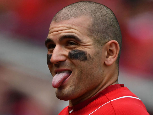 CINCINNATI, OH - MAY 19: Joey Votto #19 of the Cincinnati Reds reacts after scoring a run in the sixth inning against the Chicago Cubs at Great American Ball Park on May 19, 2018 in Cincinnati, Ohio.