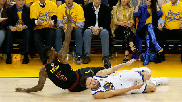 OAKLAND, CA - MAY 31: Klay Thompson #11 of the Golden State Warriors reacts after being fouled by JR Smith #5 of the Cleveland Cavaliers in Game 1 of the 2018 NBA Finals at ORACLE Arena on May 31, 2018 in Oakland, California.