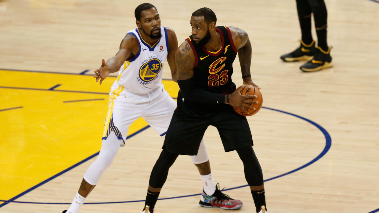 OAKLAND, CA - MAY 31: LeBron James #23 of the Cleveland Cavaliers defended by Kevin Durant #35 of the Golden State Warriors in Game 1 of the 2018 NBA Finals at ORACLE Arena on May 31, 2018 in Oakland, California.