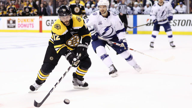 BOSTON, MA - MAY 4: Brian Gionta #12 of the Boston Bruins skates against Chris Kunitz #14 of the Tampa Bay Lightning during the third period of Game Four of the Eastern Conference Second Round during the 2018 NHL Stanley Cup Playoffs at TD Garden on May 4, 2018 in Boston, Massachusetts.