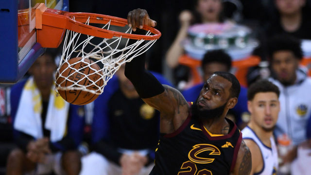 OAKLAND, CA - MAY 31: LeBron James #23 of the Cleveland Cavaliers dunks against the Golden State Warriors during the second half in Game 1 of the 2018 NBA Finals at ORACLE Arena on May 31, 2018 in Oakland, California.