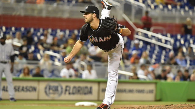 MIAMI, FL - APRIL 28: Kyle Barraclough #46 of the Miami Marlins throws a pitch during the ninth inning against the Colorado Rockies at Marlins Park on April 28, 2018 in Miami, Florida.