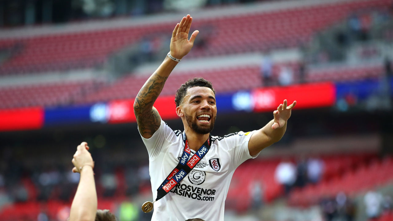 LONDON, ENGLAND - MAY 26: Ryan Fredericks of Fulham celebrates with Marcus Bettinelli of Fulham following their sides victory in the Sky Bet Championship Play Off Final between Aston Villa and Fulham at Wembley Stadium on May 26, 2018 in London, England.