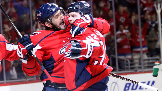 WASHINGTON, DC - APRIL 21: Evgeny Kuznetsov #92 of the Washington Capitals celebrates with Alex Ovechkin #8 after scoring a second period goal Columbus Blue Jackets during Game Five of the Eastern Conference First Round during the 2018 NHL Stanley Cup Playoffs at Capital One Arena on April 21, 2018 in Washington, DC.