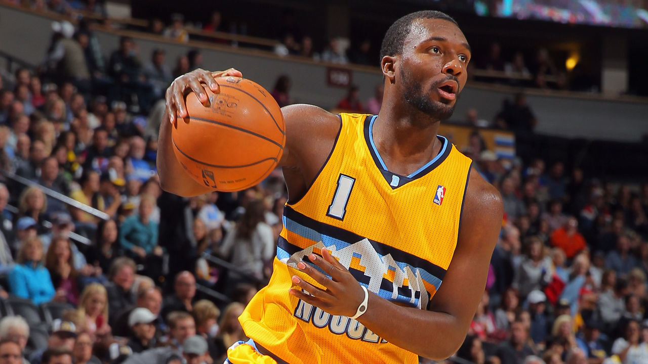DENVER, CO - NOVEMBER 15: Jordan Hamilton #1 of the Denver Nuggets controls the ball against the Minnesota Timberwolves at Pepsi Center on November 15, 2013 in Denver, Colorado. The Nuggets defeated the Timberwolves 117-113.