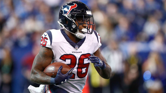 INDIANAPOLIS, IN - DECEMBER 31: Lamar Miller #26 of the Houston Texans runs with the ball against the Indianapolis Colts during the first half at Lucas Oil Stadium on December 31, 2017 in Indianapolis, Indiana.
