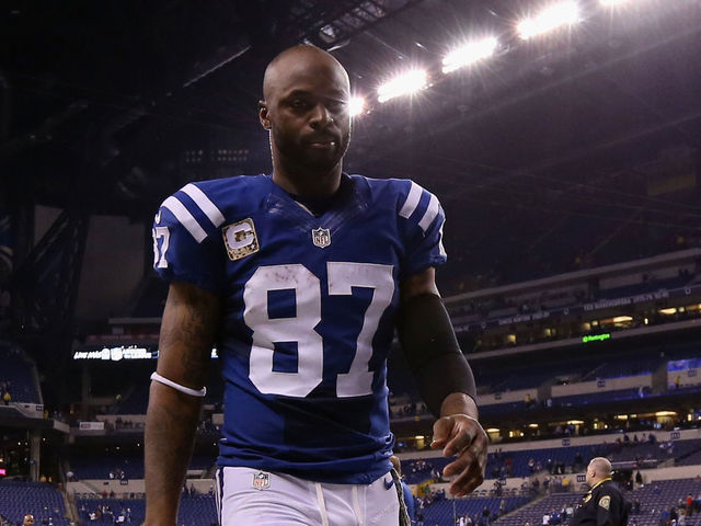 INDIANAPOLIS, IN - NOVEMBER 16: Reggie Wayne #87 of the Indianapolis Colts walks off the field after their 42-20 loss to the New England Patriots at Lucas Oil Stadium on November 16, 2014 in Indianapolis, Indiana.