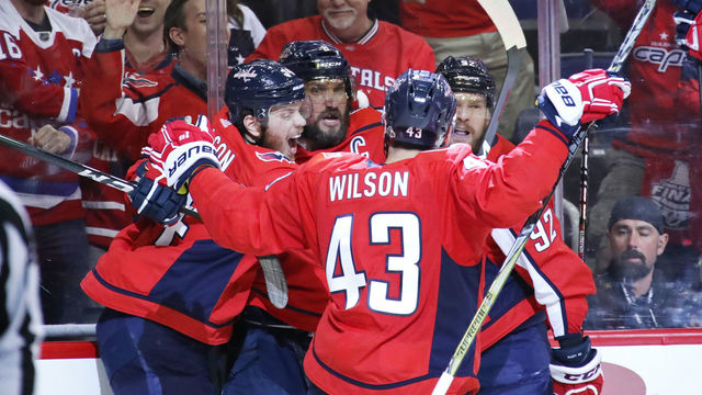 WASHINGTON, DC - JUNE 02: Alex Ovechkin #8 of the Washington Capitals is congratulated by his teammates after scoring a second-period goal against the Vegas Golden Knights in Game Three of the 2018 NHL Stanley Cup Final at Capital One Arena on June 2, 2018 in Washington, DC.