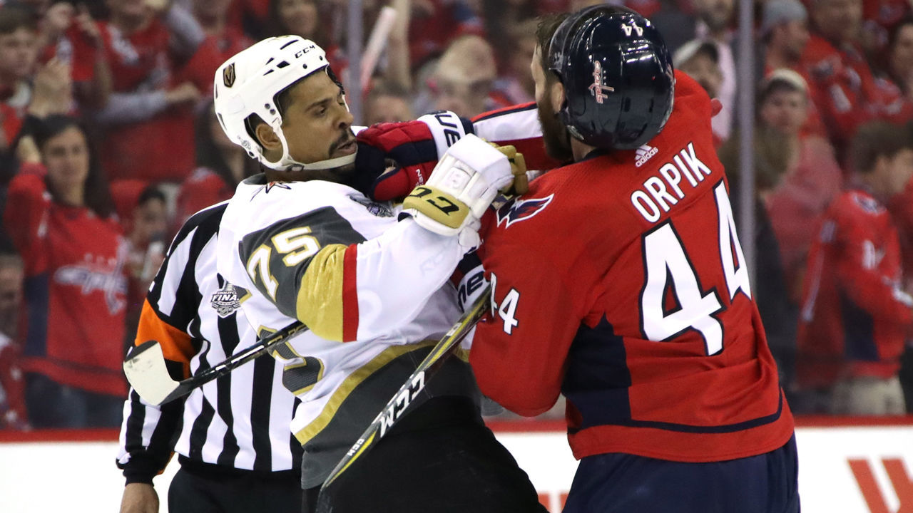 WASHINGTON, DC - JUNE 02: Ryan Reaves #75 of the Vegas Golden Knights and Brooks Orpik #44 of the Washington Capitals mix it up after the whistle during the third period in Game Three of the 2018 NHL Stanley Cup Final at Capital One Arena on June 2, 2018 in Washington, DC.
