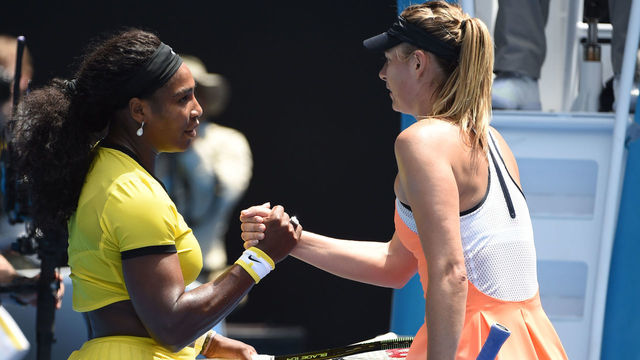 Serena Williams of the US (L) shakes hands as she celebrates after victory in her women's singles match against Russia's Maria Sharapova on day nine of the 2016 Australian Open tennis tournament in Melbourne on January 26, 2016. AFP PHOTO / WILLIAM WEST-- IMAGE RESTRICTED TO EDITORIAL USE - STRICTLY NO COMMERCIAL USE / AFP / WILLIAM WEST