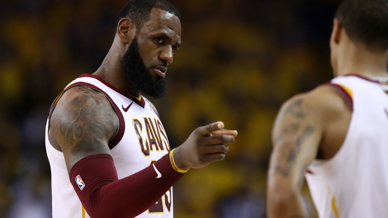 OAKLAND, CA - JUNE 03: LeBron James #23 of the Cleveland Cavaliers reacts with George Hill #3 against the Golden State Warriors during the third quarter in Game 2 of the 2018 NBA Finals at ORACLE Arena on June 3, 2018 in Oakland, California.