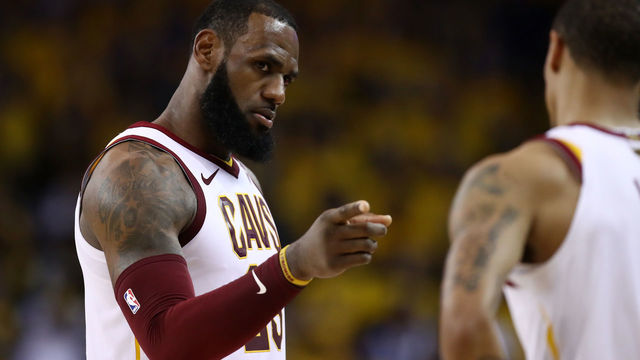 OAKLAND, CA - JUNE 03: LeBron James #23 of the Cleveland Cavaliers reacts with George Hill #3 against the Golden State Warriors during the third quarter in Game 2 of the 2018 NBA Finals at ORACLE Arena on June 3, 2018 in Oakland, California.