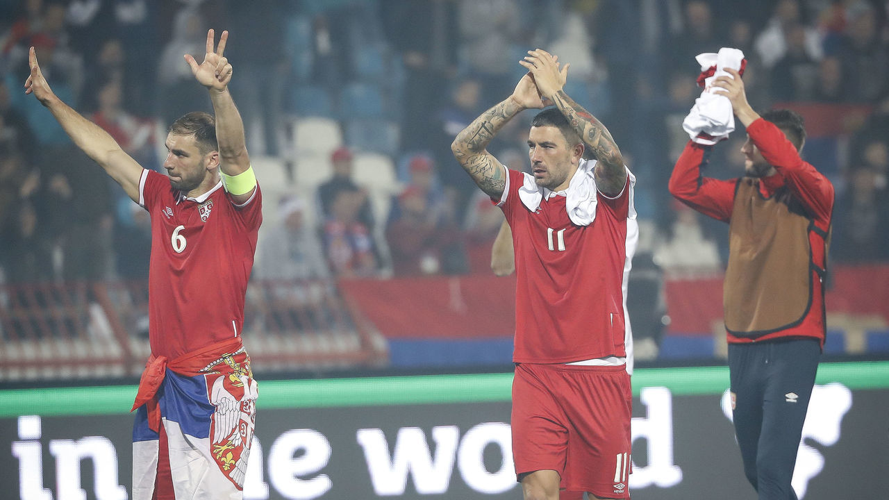 BELGRADE, SERBIA - OCTOBER 09: Branislav Ivanovic (L) and Aleksandar Kolarov (R) of Serbia celebrate their victory after FIFA 2018 World Cup Qualifier between Serbia and Georgia at stadium Rajko Mitic on October 9, 2017 in Belgrade.