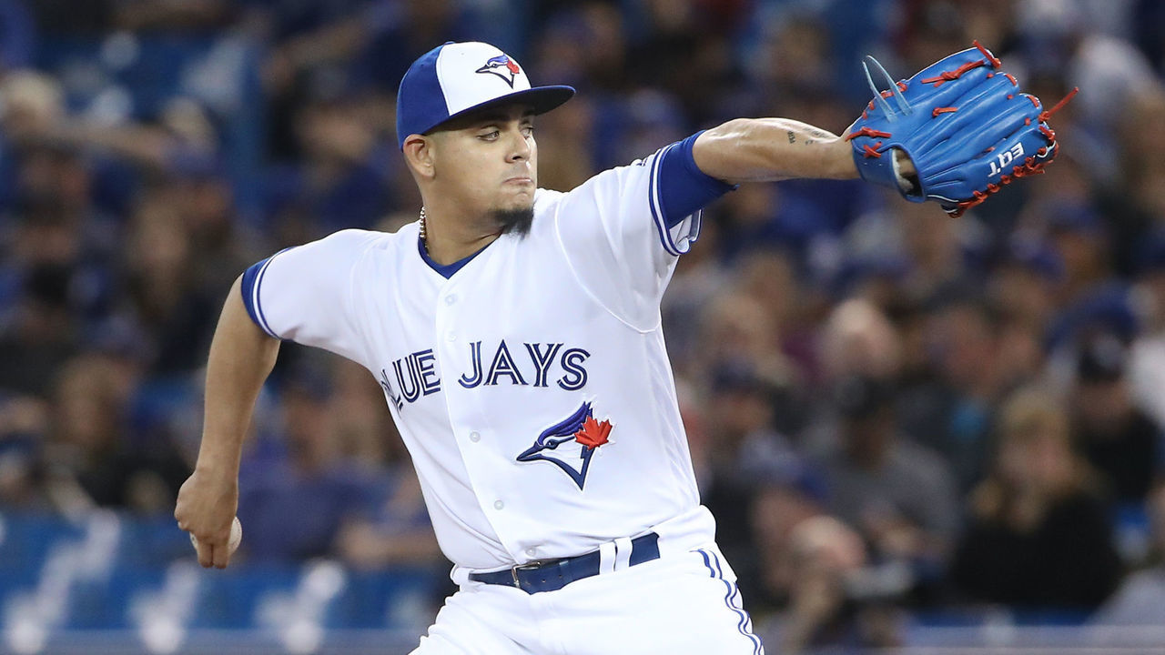 TORONTO, ON - APRIL 11: Roberto Osuna #54 of the Toronto Blue Jays delivers a pitch in the ninth inning during MLB game action against the Milwaukee Brewers at Rogers Centre on April 11, 2017 in Toronto, Canada.