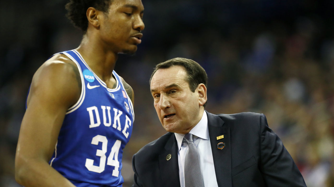 OMAHA, NE - MARCH 25: Head coach Mike Krzyzewski speaks with Wendell Carter Jr #34 of the Duke Blue Devils against the Kansas Jayhawks during the first half in the 2018 NCAA Men's Basketball Tournament Midwest Regional at CenturyLink Center on March 25, 2018 in Omaha, Nebraska.