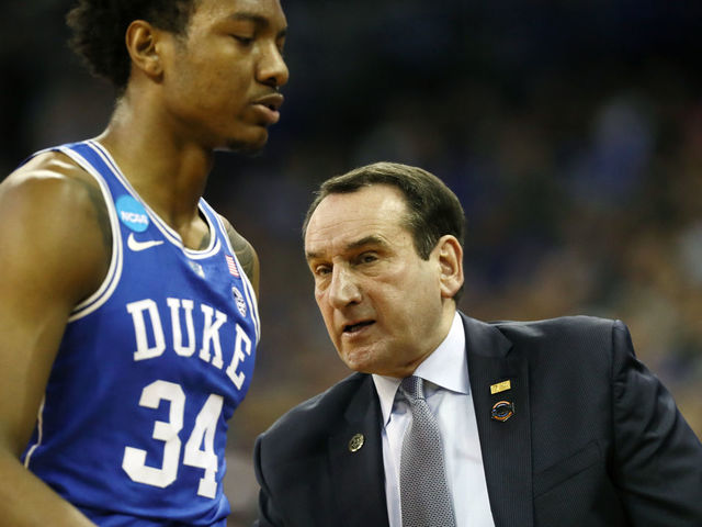 OMAHA, NE - MARCH 25: Head coach Mike Krzyzewski speaks with Wendell Carter Jr #34 of the Duke Blue Devils against the Kansas Jayhawks during the first half in the 2018 NCAA Men's Basketball Tournament Midwest Regional at CenturyLink Center on March 25, 2018 in Omaha, Nebraska.