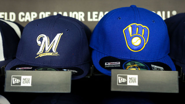 MILWAUKEE, WI - APRIL 24: Baseball hats with the current logo, left, and retro logo sit on display at Miller Park on April 24, 2016 in Milwaukee, Wisconsin. *** Local Caption ***