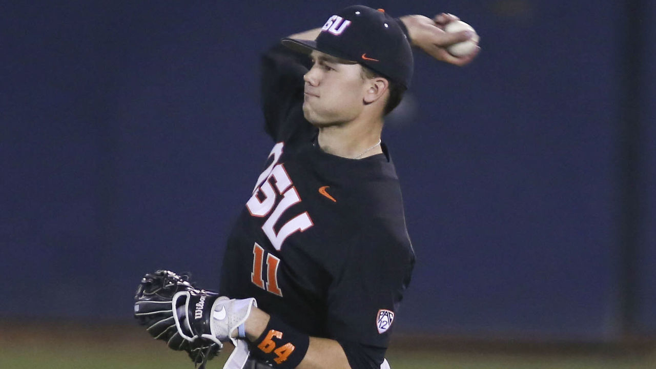 TUCSON, AZ - APRIL 07: Oregon State Beavers outfielder Trevor Larnach (11) throws the ball during a college baseball game between Oregon State Beavers and the Arizona Wildcats on April 07, 2018, at Hi Corbett Field in Tucson, AZ.