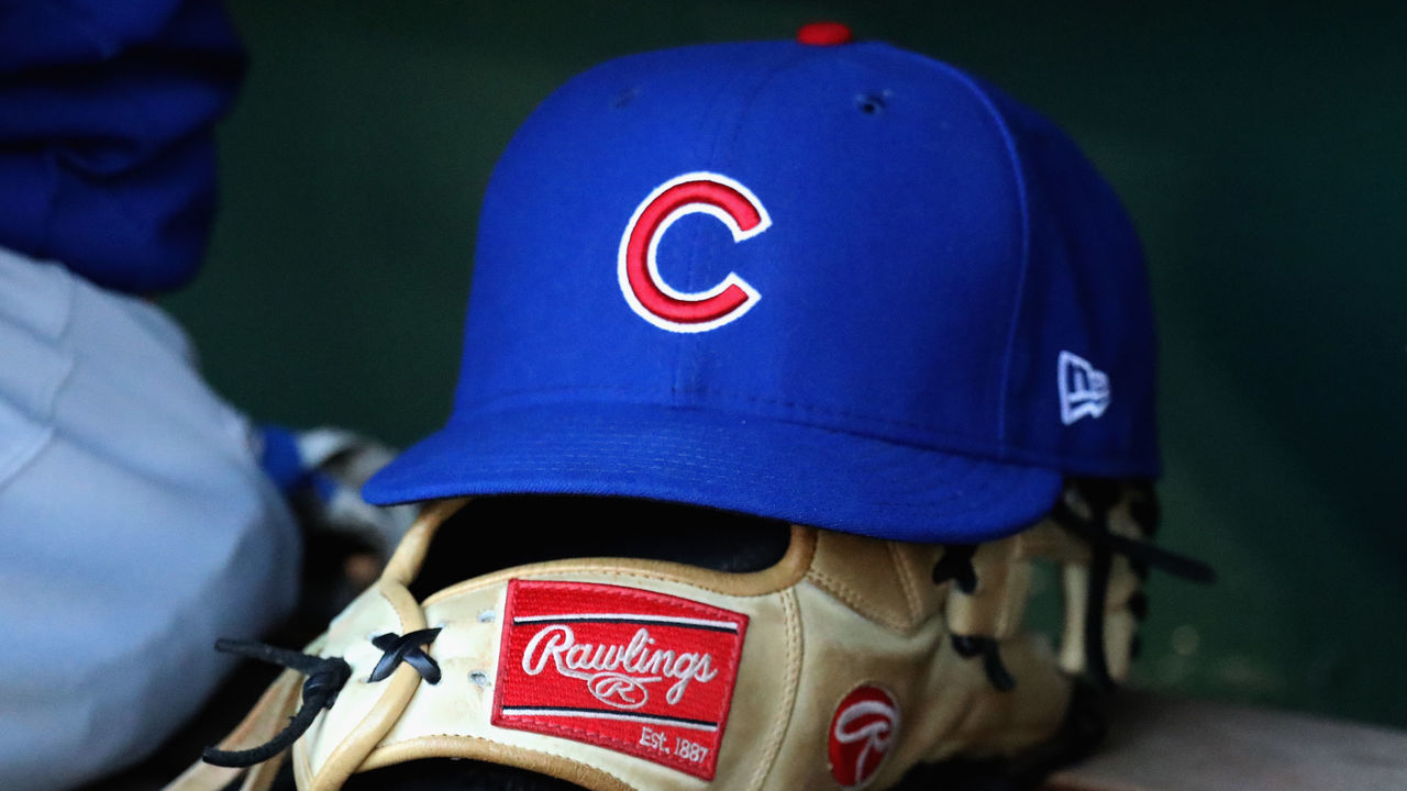 WASHINGTON, DC - JUNE 26: A hat and glove sit on the bench in the Chicago Cubs dugout during the Cubs game against the Washington Nationals at Nationals Park on June 26, 2017 in Washington, DC.