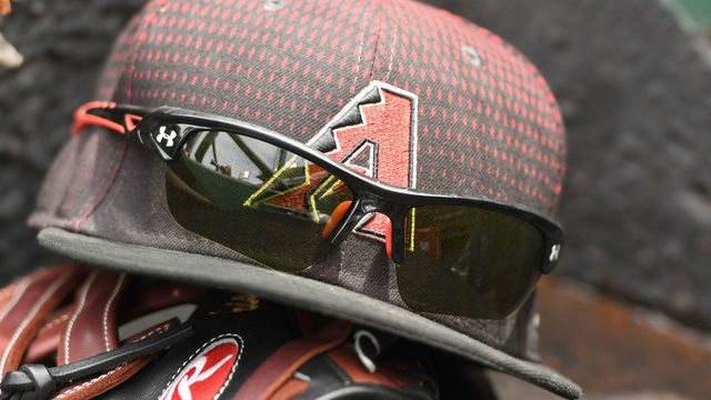 WASHINGTON, DC - MAY 04: Arizona Diamondbacks cap and glove in the dug out during a baseball game against the Washington Nationals at Nationals Park on May 4, 2017 in Washington, DC. The Nationals won 4-2.