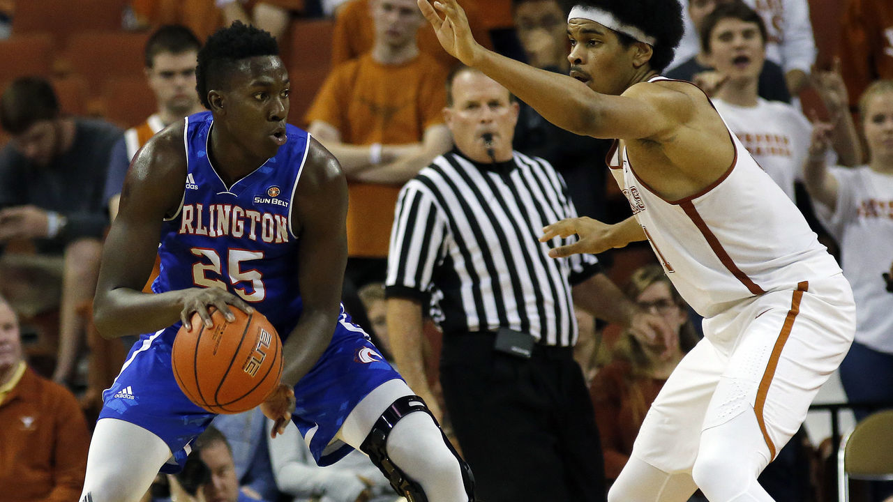 AUSTIN, TX - NOVEMBER 29: Kevin Hervey #25 of the Texas-Arlington Mavericks holds the ball away from Jarrett Allen #31 of the Texas Longhorns at the Frank Erwin Center on November 29, 2016 in Austin, Texas.