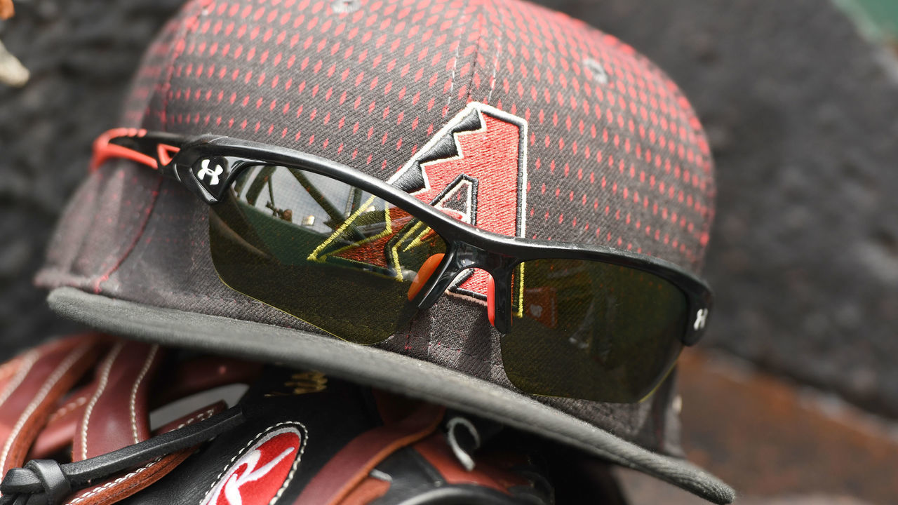 WASHINGTON, DC - MAY 04: Arizona Diamondbacks cap and glove in the dug out during a baseball game against the Washington Nationals at Nationals Park on May 4, 2017 in Washington, DC. The Nationals won 4-2.