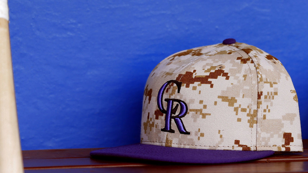 PHILADELPHIA, PA - MAY 26: A Colorado Rockies camouflaged caps in honor of Memorial Day sits on the bench before the start of their game against the Philadelphia Phillies at Citizens Bank Park on May 26, 2014 in Philadelphia, Pennsylvania.