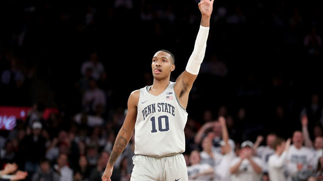 NEW YORK, NY - MARCH 27: Tony Carr #10 of the Penn State Nittany Lions celebrates a three point shot in the second quarter against the Mississippi State Bulldogs during their 2018 National Invitation Tournament Championship semifinals game at Madison Square Garden on March 27, 2018 in New York City.