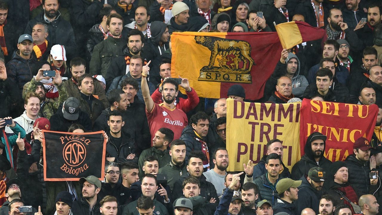 Roma fans look on during the UEFA Champions League first leg semi-final football match between Liverpool and Roma at Anfield stadium in Liverpool, north west England on April 24, 2018.