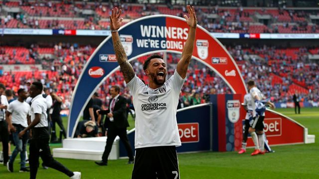 Fulham's English defender Ryan Fredericks celebrates on the pitch after the English Championship play-off final football match between Aston Villa and Fulham at Wembley Stadium in London on May 26, 2018. - Fulham won the game 1-0, and are promoted to the Premier League.