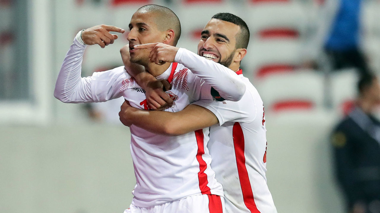 Tunisian forward Wahbi Khazri (L) celebrates after scoring a goal during the friendly football match between Tunisia vs Costa Rica on March 27, 2018 at the Allianz Riviera stadium in Nice. / AFP PHOTO / VALERY HACHE