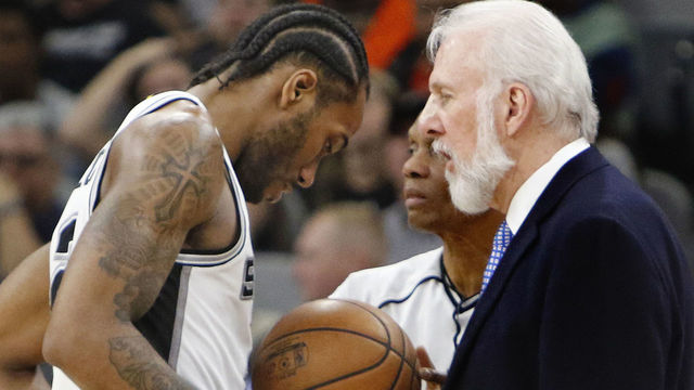 SAN ANTONIO,TX - MARCH 13: Kawhi Leonard #2 of the San Antonio Spurs talks with head coach Gregg Popovic at AT&T Center on March 13, 2017 in San Antonio, Texas. NOTE TO USER: User expressly acknowledges and agrees that , by downloading and or using this photograph, User is consenting to the terms and conditions of the Getty Images License Agreement.