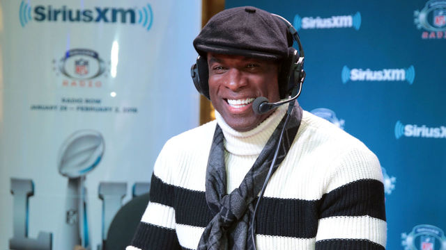 BLOOMINGTON, MN - FEBRUARY 01: Former NFL player and NFL Hall of Fame player Deion Sanders attends SiriusXM at Super Bowl LII Radio Row at the Mall of America on February 1, 2018 in Bloomington, Minnesota.