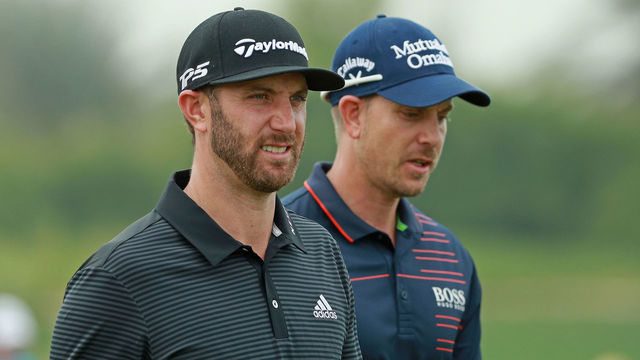 ABU DHABI, UNITED ARAB EMIRATES - JANUARY 19: Dustin Johnson of the United States (L) and Henrik Stenson of Sweden walk together on the ninth hole during the first round of the Abu Dhabi HSBC Championship at Abu Dhabi Golf Club on January 19, 2017 in Abu Dhabi, United Arab Emirates.