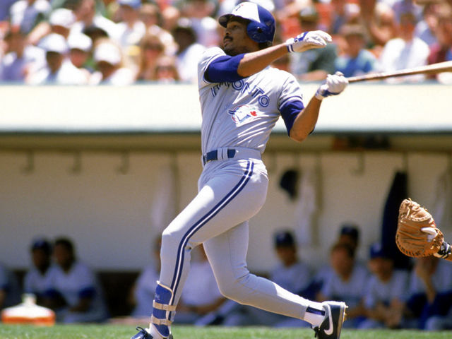 OAKLAND, CA - 1989: George Bell #11 of the Toronto Blue Jays swings at a pitch during a 1989 game against the Oakland Athletics at the Oakland-Alameda Coliseum in Oakland, California.