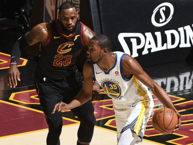 CLEVELAND, OH - JUNE 6: Kevin Durant #35 of the Golden State Warriors handles the ball against LeBron James #23 of the Cleveland Cavaliers during Game Three of the 2018 NBA Finals on June 6, 2018 at Quicken Loans Arena in Cleveland, Ohio. Mandatory Copyright Notice: Copyright 2018 NBAE