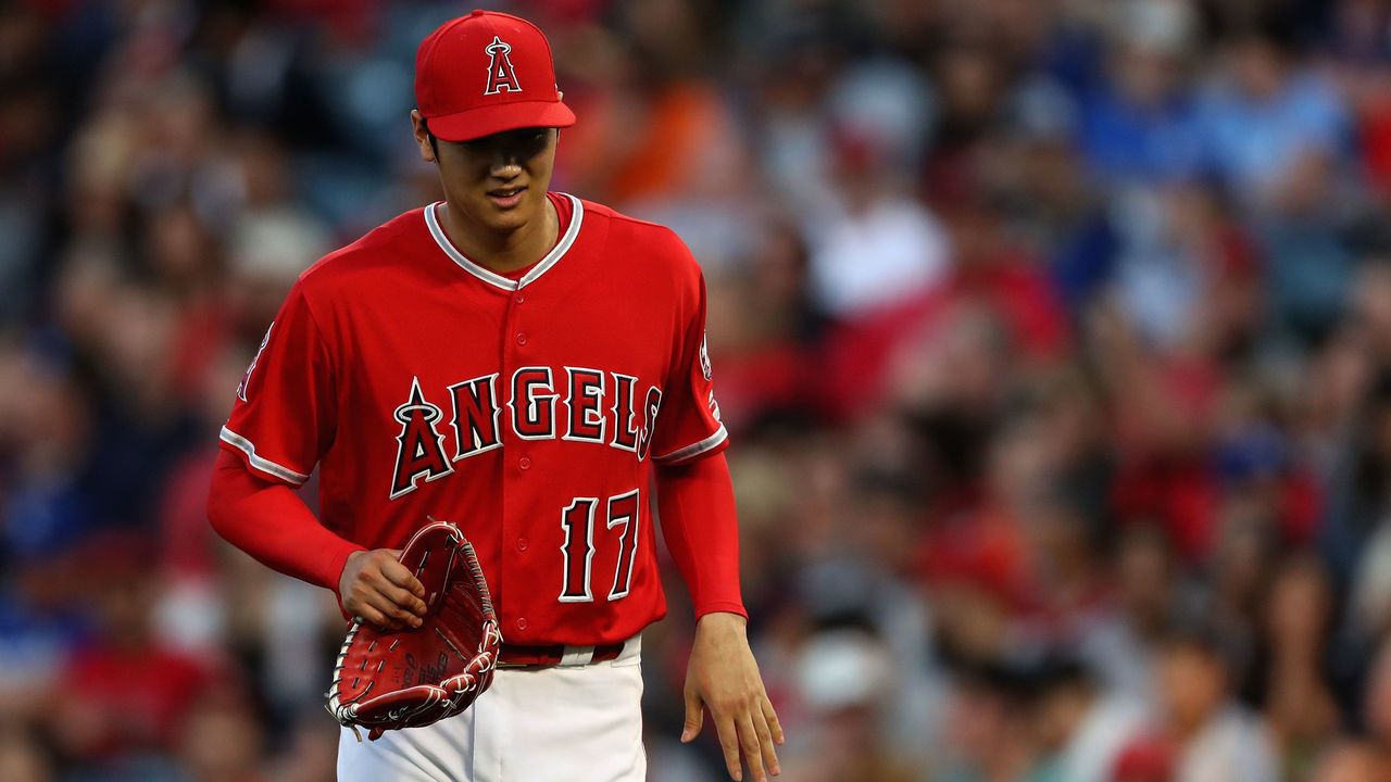 ANAHEIM, CA - JUNE 06: Shohei Ohtani #17 of the Los Angeles Angels of Anaheim walks to the dugout during the fourth inning of a game against the Kansas City Royals at Angel Stadium on June 6, 2018 in Anaheim, California.