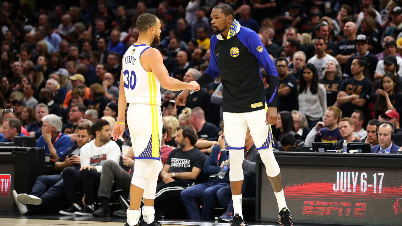 CLEVELAND, OH - JUNE 06: Kevin Durant #35 of the Golden State Warriors reacts with Stephen Curry #30 against the Cleveland Cavaliers in the second half during Game Three of the 2018 NBA Finals at Quicken Loans Arena on June 6, 2018 in Cleveland, Ohio.