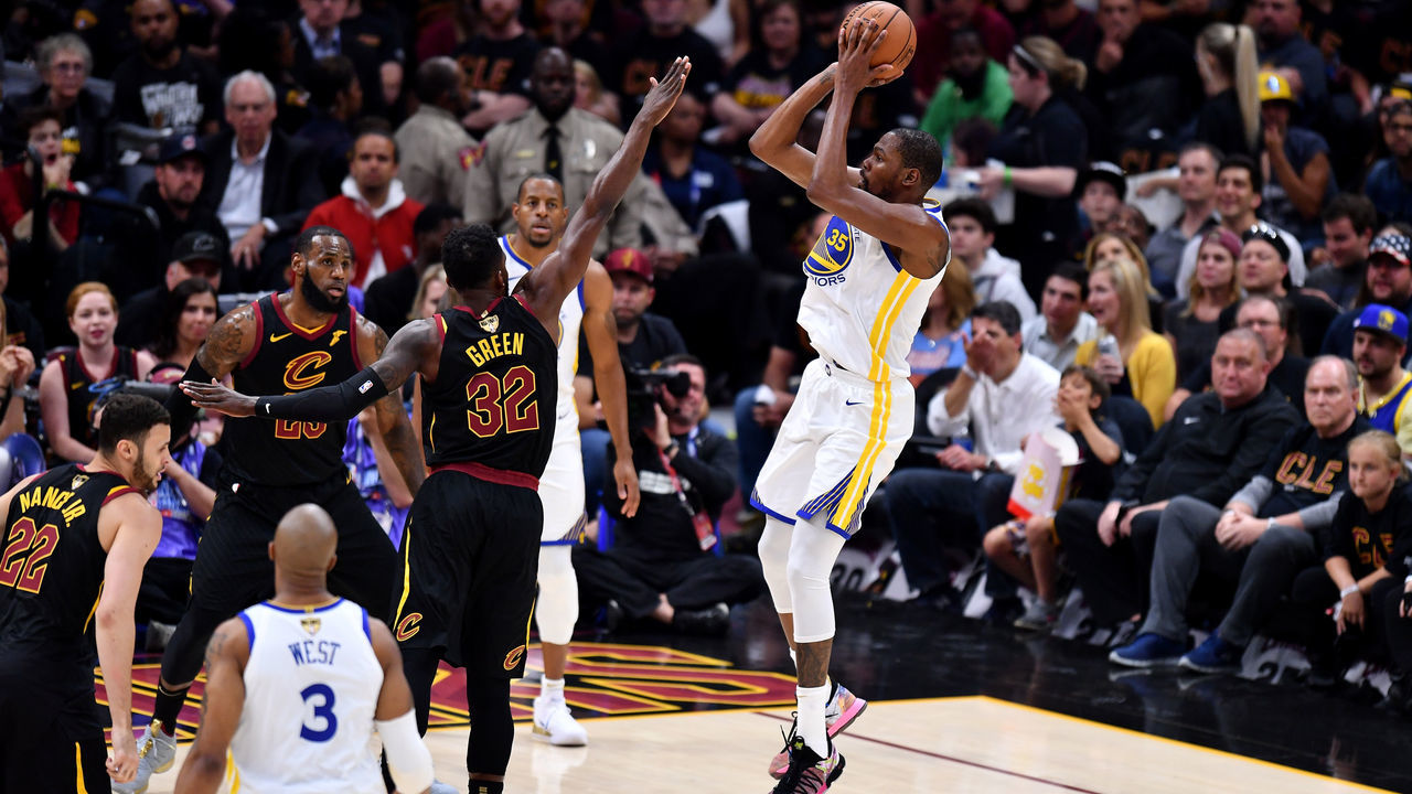 CLEVELAND, OH - JUNE 06: Kevin Durant #35 of the Golden State Warriors attempts a jumper over Jeff Green #32 of the Cleveland Cavaliers in the first half during Game Three of the 2018 NBA Finals at Quicken Loans Arena on June 6, 2018 in Cleveland, Ohio.