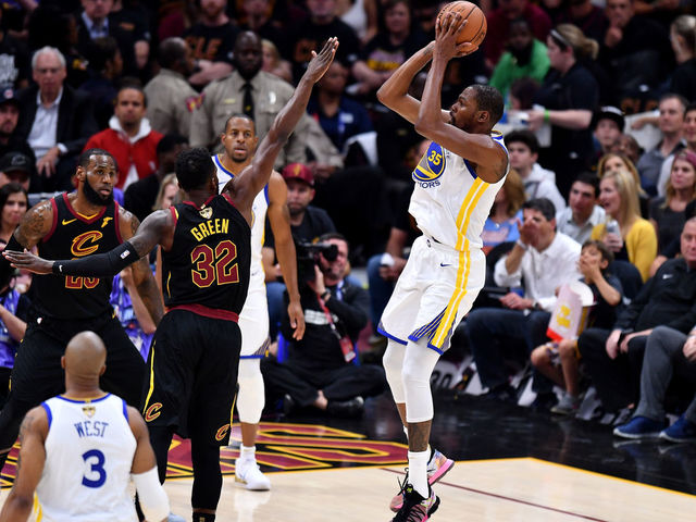 CLEVELAND, OH - JUNE 06: Kevin Durant #35 of the Golden State Warriors attempts a jumper over Jeff Green #32 of the Cleveland Cavaliers in the first half during Game Three of the 2018 NBA Finals at Quicken Loans Arena on June 6, 2018 in Cleveland, Ohio.