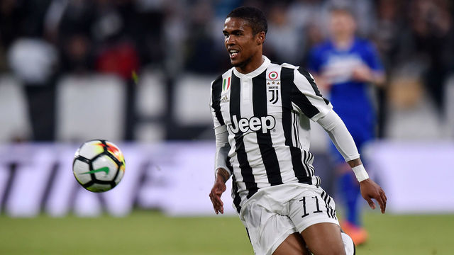 TURIN, ITALY - APRIL 15: Douglas Costa of Juventus in action during the serie A match between Juventus and UC Sampdoria at Allianz Stadium on April 15, 2018 in Turin, Italy.