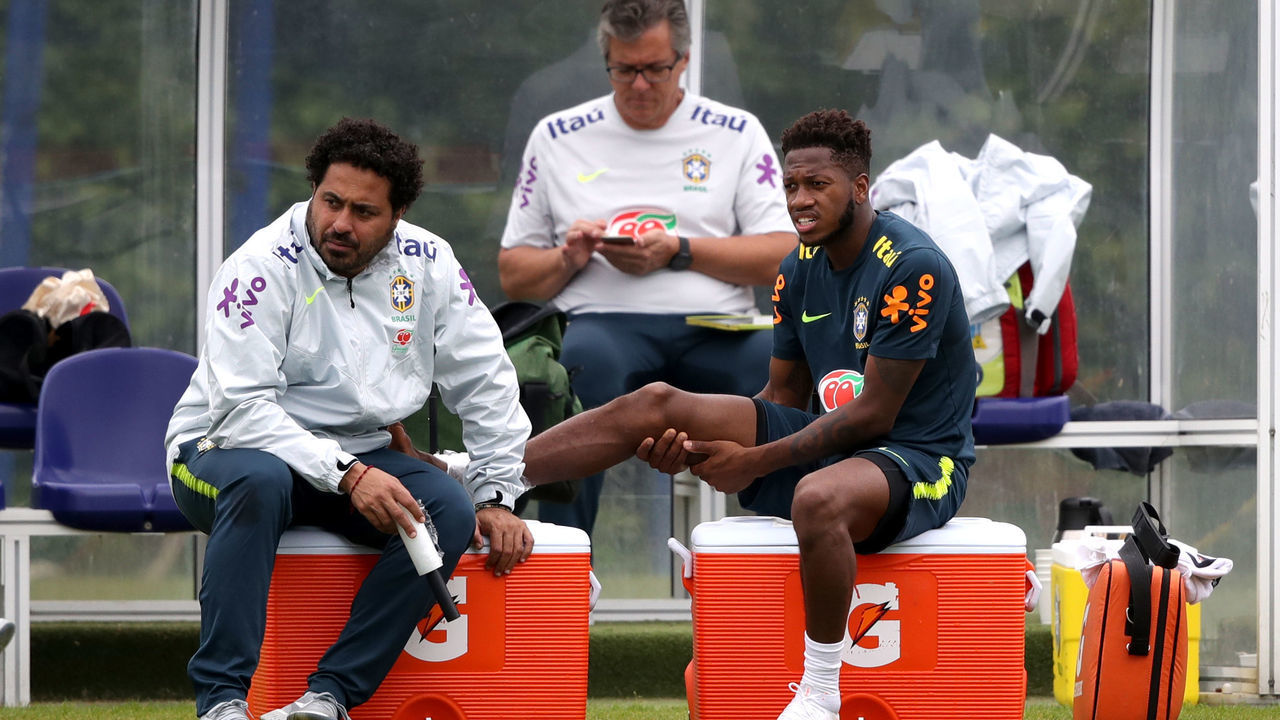 Brazil's Fred watches from the sidelines after suffering an injury during the training session at Enfield Training Ground, London.