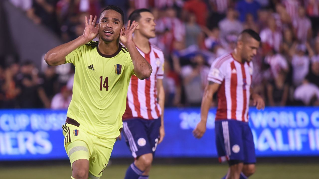 Venezuela's Yangel Herrera celebrates after scoring against Paraguay during their 2018 World Cup football qualifier match in Asuncion, on October 10, 2017. / AFP PHOTO / FAVIO FALCON