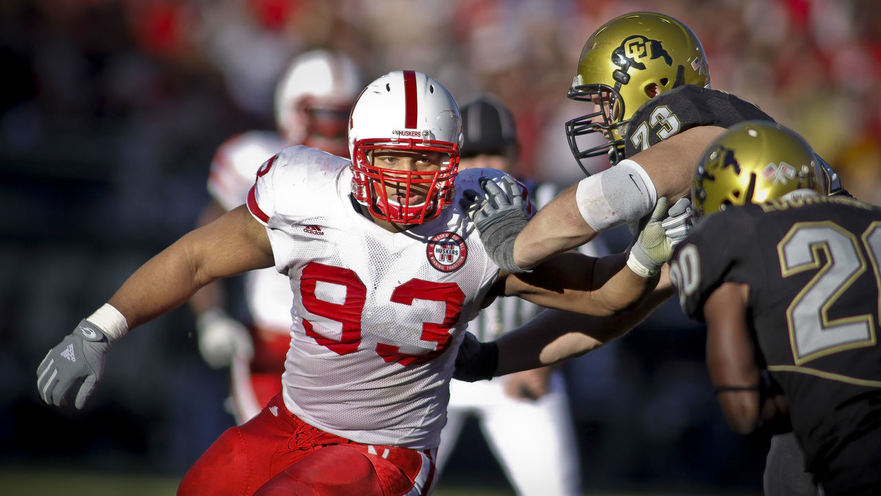 November 29, 2009: 3:53:30 PM - Nebraska Cornhuskers defensive tackle Ndamukong Suh (#93) fights off the block of Colorado's Ryan Miller (#73) as he goes after the tackle of Colorado running back Brian Lockridge (#20) during the first half of their game at Folsom Field in Boulder, Co. Nebraska won the game 28-20. Suh is one of the top players in the nation, a candidate for the Heisman trophy and a likely top NFL draft pick.