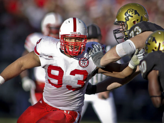 November 29, 2009: 3:53:30 PM - Nebraska Cornhuskers defensive tackle Ndamukong Suh (#93) fights off the block of Colorado's Ryan Miller (#73) as he goes after the tackle of Colorado running back Brian Lockridge (#20) during the first half of their game at Folsom Field in Boulder, Co. Nebraska won the game 28-20. Suh is one of the top players in the nation, a candidate for the Heisman trophy and a likely top NFL draft pick.