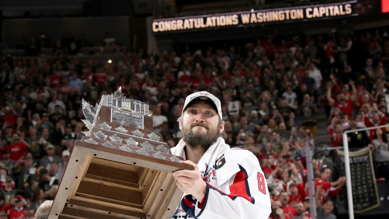 LAS VEGAS, NV - JUNE 07: Alex Ovechkin #8 of the Washington Capitals skates with the Conn Smythe Trophy after his team defeats the Vegas Golden Knights 4-3 in Game Five of the 2018 NHL Stanley Cup Final at T-Mobile Arena on June 7, 2018 in Las Vegas, Nevada.