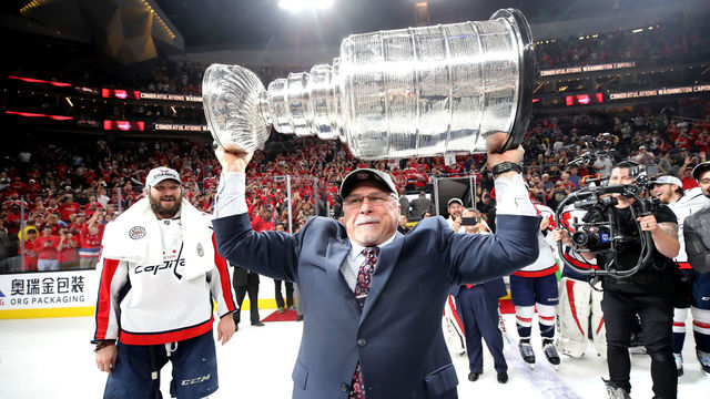 LAS VEGAS, NV - JUNE 07: Head coach Barry Trotz of the Washington Capitals hoists the Stanley Cup after his team defeated the Vegas Golden Knights 4-3 in Game Five of the 2018 NHL Stanley Cup Final at T-Mobile Arena on June 7, 2018 in Las Vegas, Nevada.