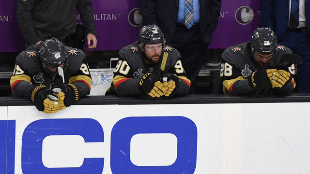 LAS VEGAS, NV - JUNE 07: (L-R) Alex Tuch #89, Tomas Tatar #90 and William Carrier #28 of the Vegas Golden Knights sit on the bench as they watch the Washington Capitals celebrate their 4-3 win in Game Five of the 2018 NHL Stanley Cup Final at T-Mobile Arena on June 7, 2018 in Las Vegas, Nevada.