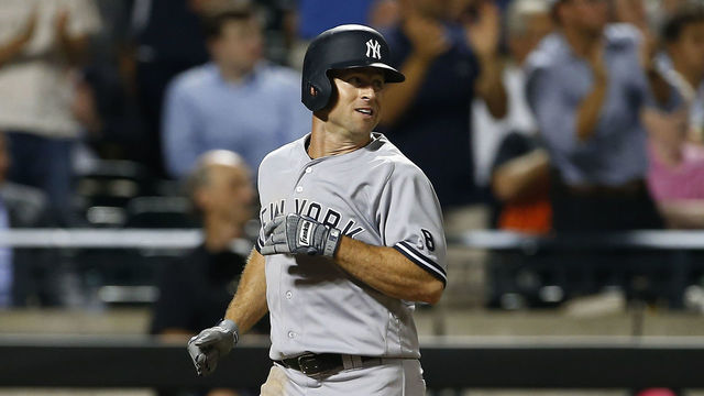 NEW YORK, NY - AUGUST 01: Brett Gardner #11 of the New York Yankees scores on a double by Jacoby Ellsbury #22 during the fifth inning against the New York Mets at Citi Field on August 1, 2016 in the Flushing neighborhood of the Queens borough of New York City.