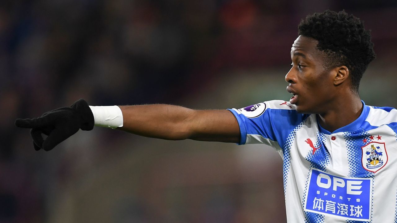 Huddersfield Town's Swiss-born Dutch defender Terence Kongolo reacts during the English Premier League football match between Huddersfield Town and Liverpool at the John Smith's stadium in Huddersfield, northern England on January 30, 2018. / AFP PHOTO / Paul ELLIS /